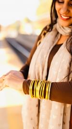 Instagram post by @totallymom_sense for BuDhaGirl. Caption reads: Love these @budhagirl All Weather Bangles®! 🌟✨....