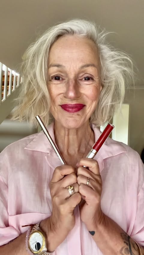 Instagram post by @themiddleagedgoddess for Trinny London. Caption reads: [...] a convert to a bold lip thanks to....