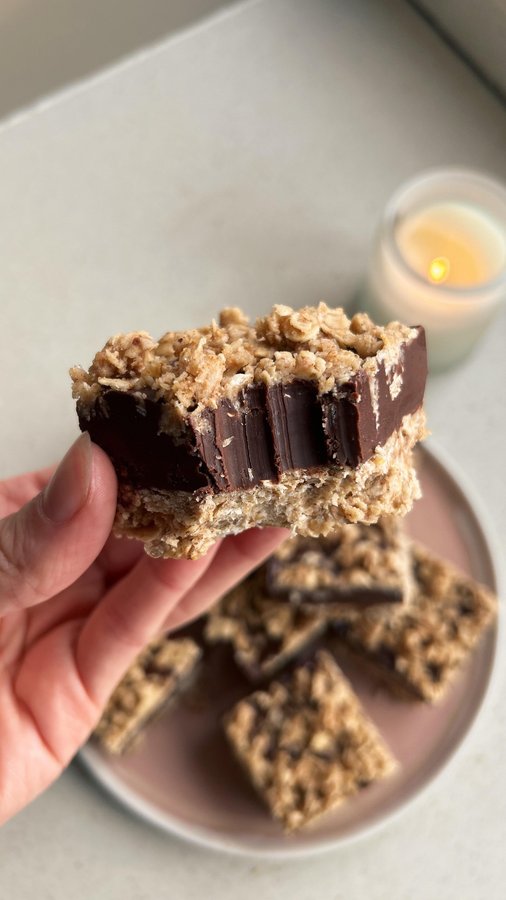 Instagram post by @georginaburgess_ for Natvia. Caption reads: Chocolate Orange Fudge Bars 🍫🍊 comment ‘fudge’....