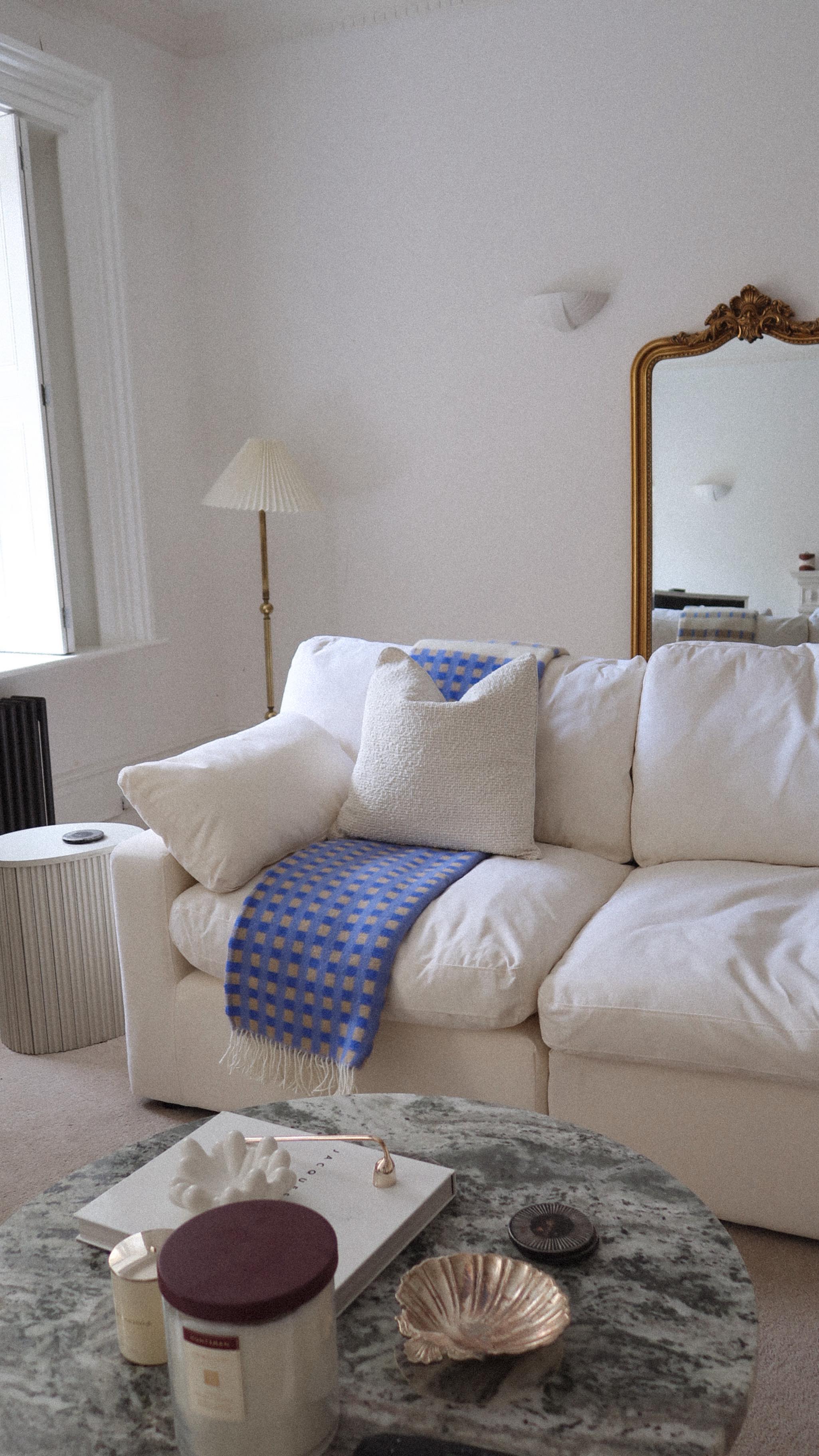 Instagram post by @gabie.godfrey for Dusk. Caption reads: It’s like a cloud ☁️ 

New dream sofa from....