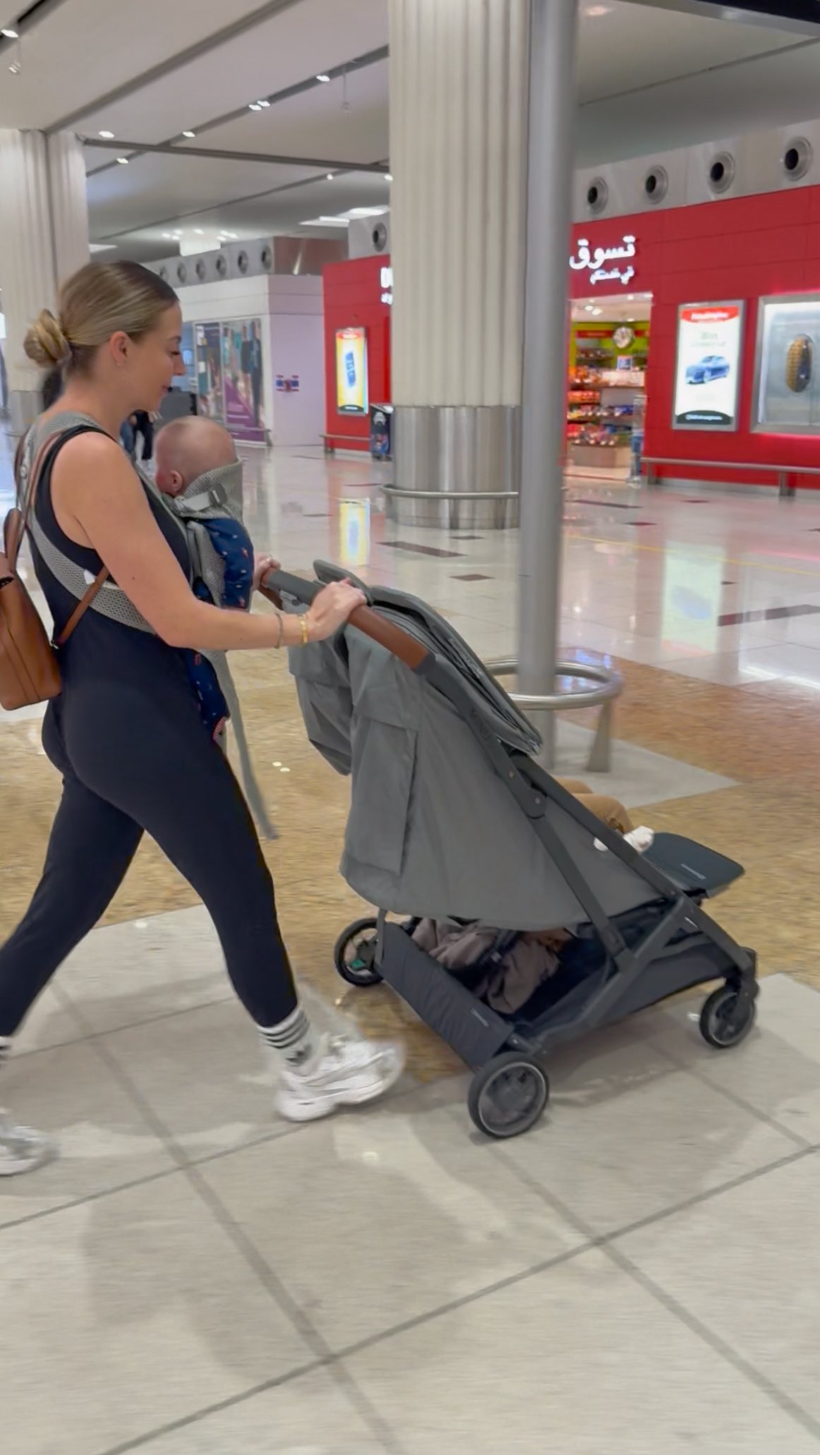 Instagram post by @dubz.uae for UPPAbaby. Caption reads: We recently flew from Dubai to England and it was....