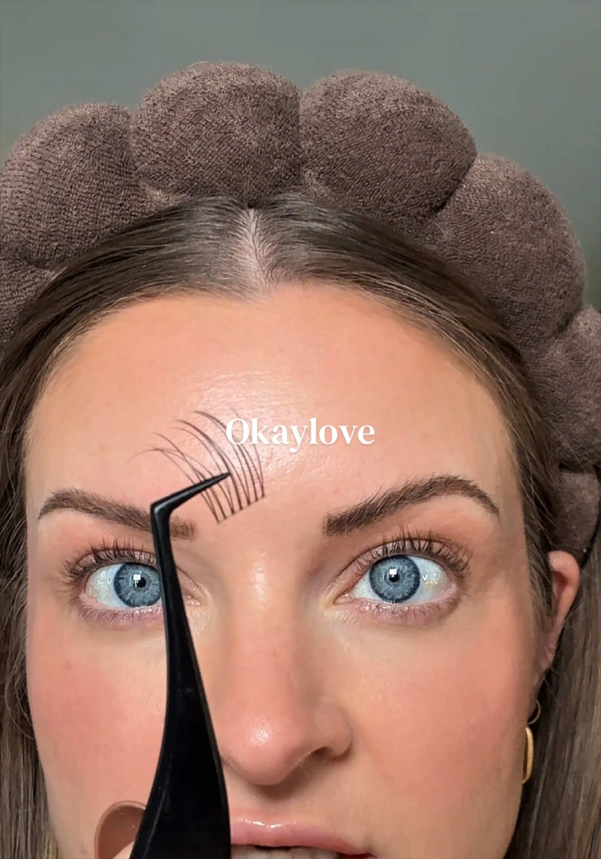 TikTok post by @raisingbruin for Okay Love Lashes. Caption reads: [...] #lashclusters #brownlashes #okaylovelashes....