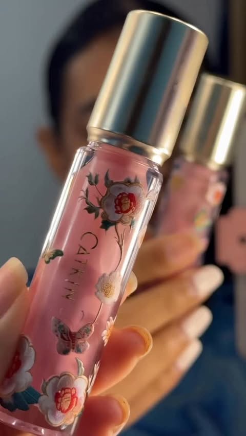 Instagram post by @gacela_beauty for Catkin. Caption reads: My pink lip combo con gloss de @catkincosmetics in....