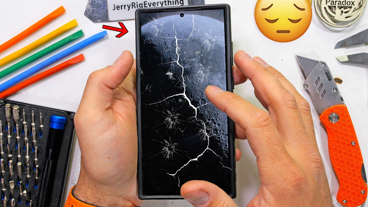 YouTube post by @JerryRigEverything for iFixit. Caption reads: I BROKE MY PHONE -- KARMA IS REAL.