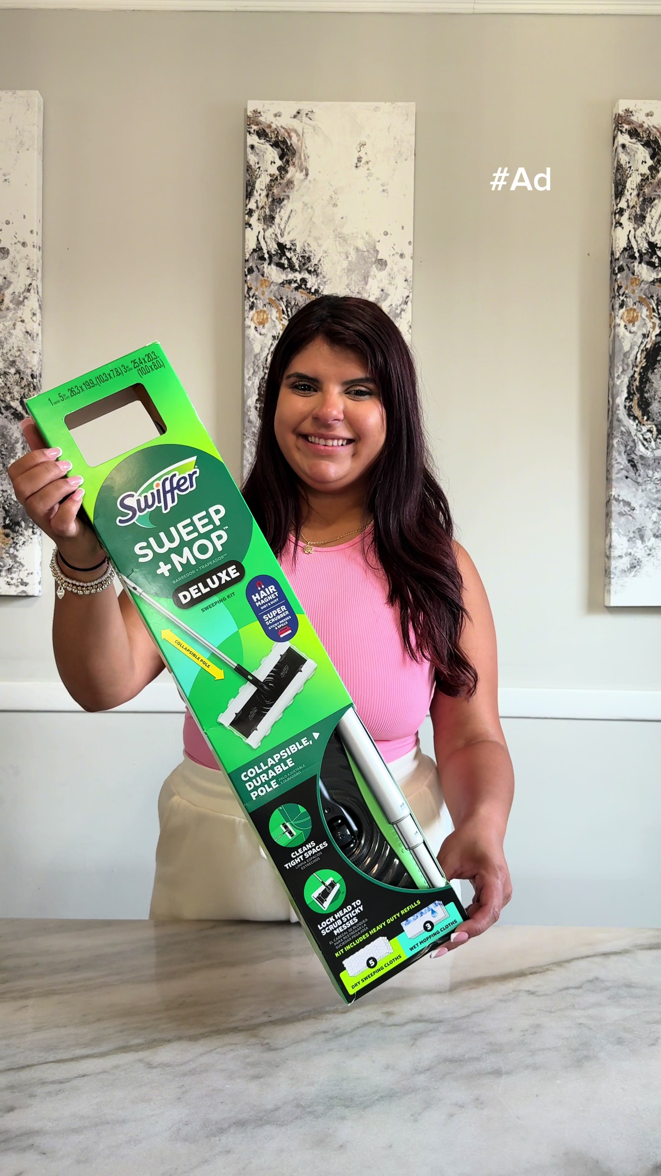 TikTok post by @lafamiliagomes for Swiffer. Caption reads: #Ad #SwifferPartner @Swiffer Sweep + Mop Deluxe....