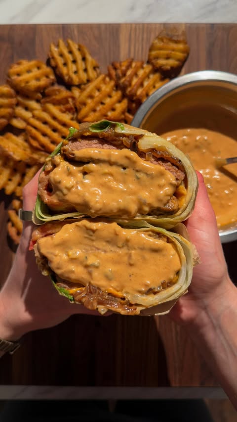 Instagram post by @itsvegansis for Beyond Meat. Caption reads: [...] double cheeseburger lettuce wrap with....