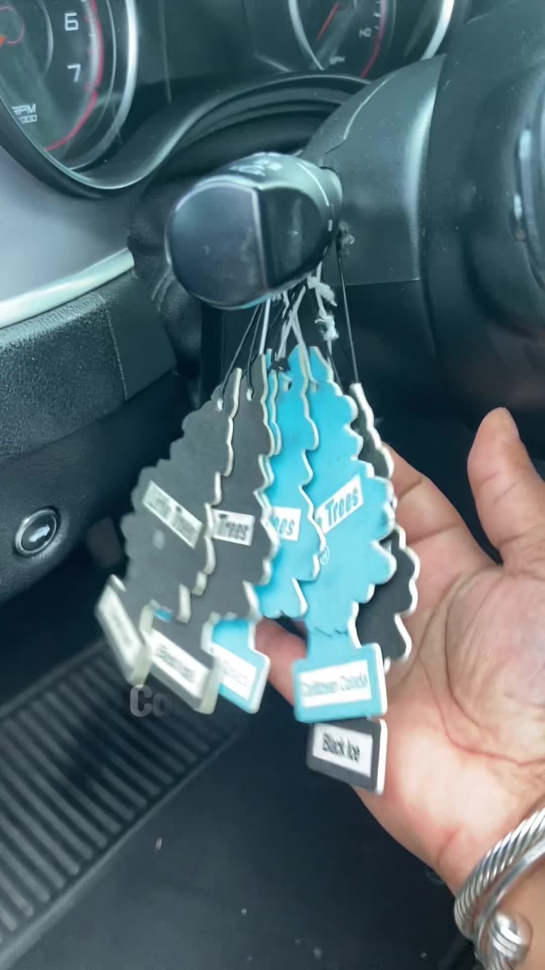 TikTok post by @who_needs_approval for Blackline Car Care. Caption reads: [...] #carairfreshener #cartiktok....
