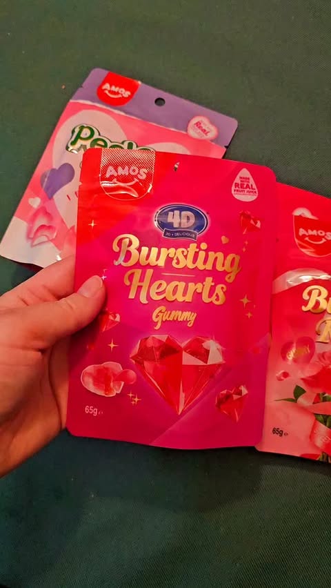 Instagram post by @madaraveanu for Amos Sweets. Caption reads: [...] getting ready for Valentines day with....