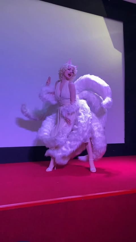 Instagram post by @odettecrystal for League of Legends. Caption reads: My performance Ahri Marilyn Monroe 💋 #cosplay....