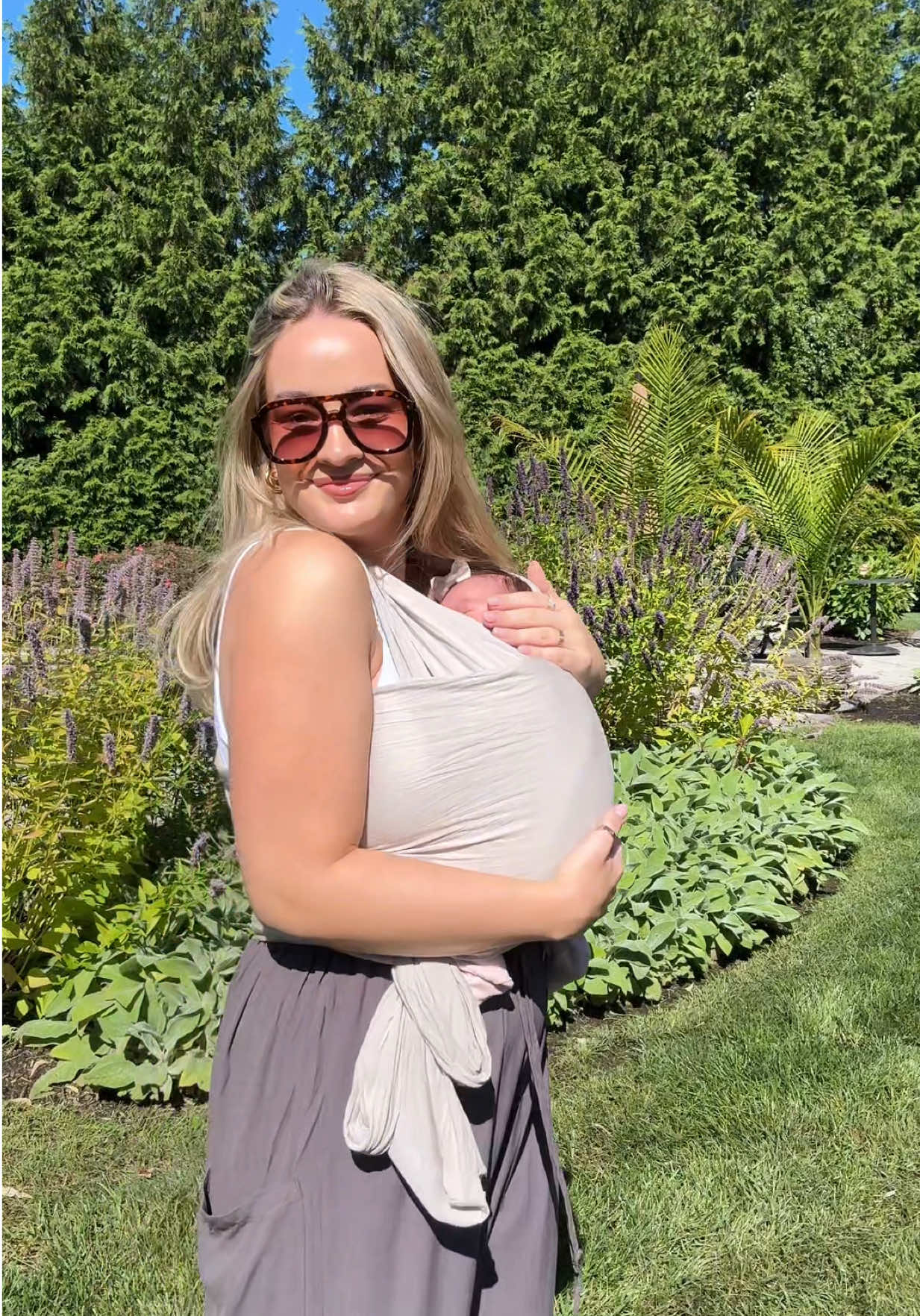 TikTok post by @kaitmportella for Solly Baby. Caption reads: [...] Link in my bio will save you some $! @Solly....