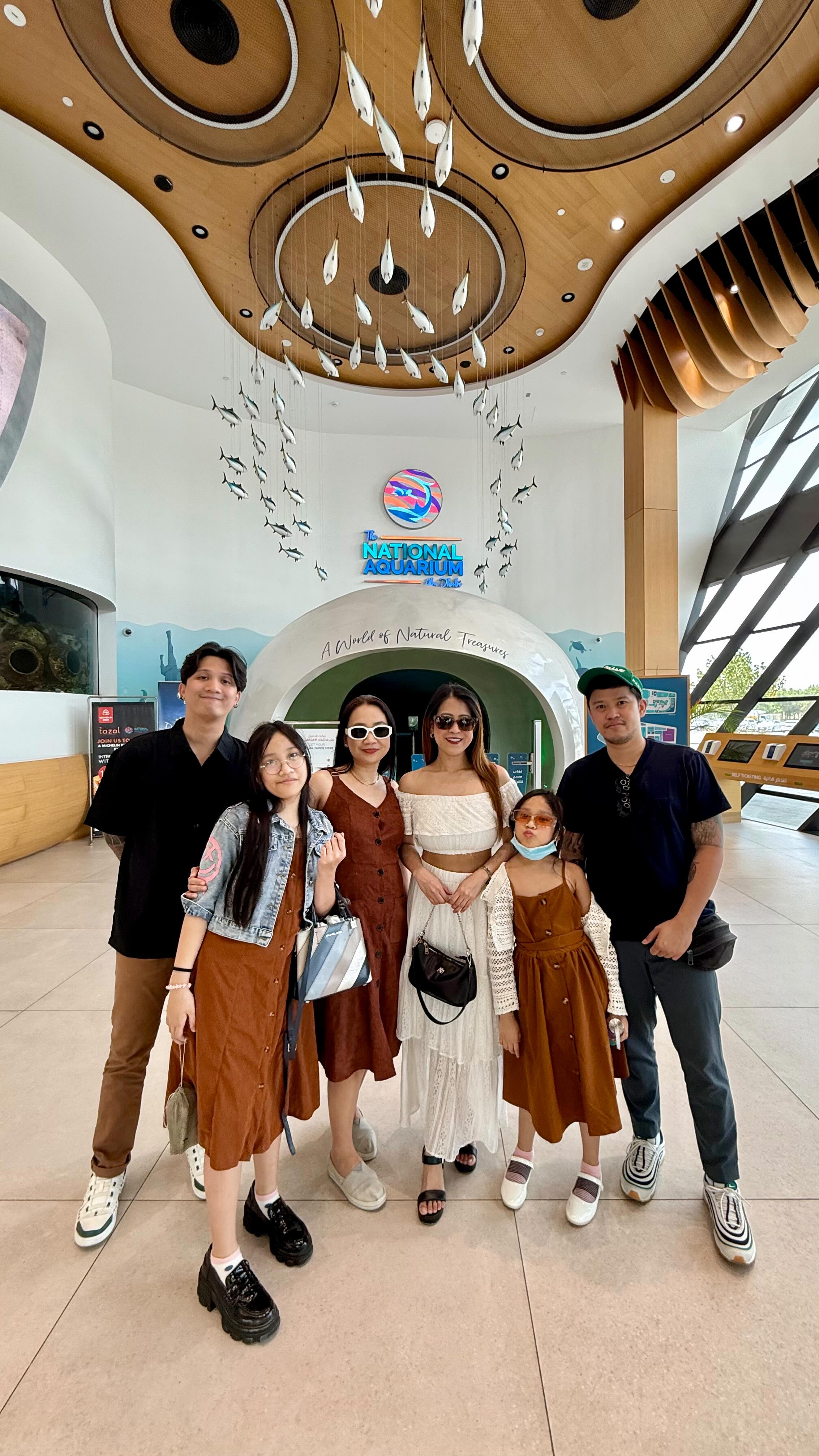 Instagram post by @cariellayel for Visit Abu Dhabi. Caption reads: Family day well spent at @thenationalaq Abu Dhabi....