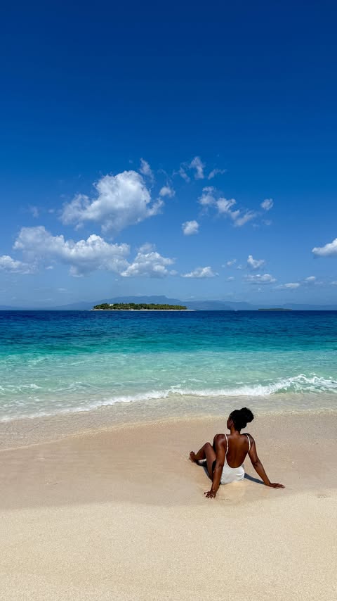 Instagram post by @bashabroad for American Airlines. Caption reads: Day 1 of our anniversary trip in Fiji at....