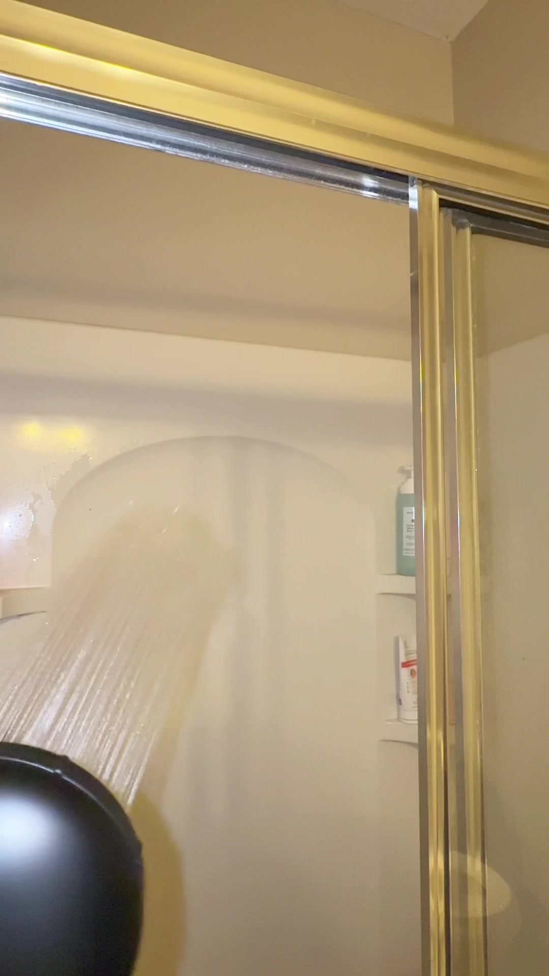 TikTok post by @iamadunniadebckup for Eskiin. Caption reads: @eskiin #filteredshowerhead [...].