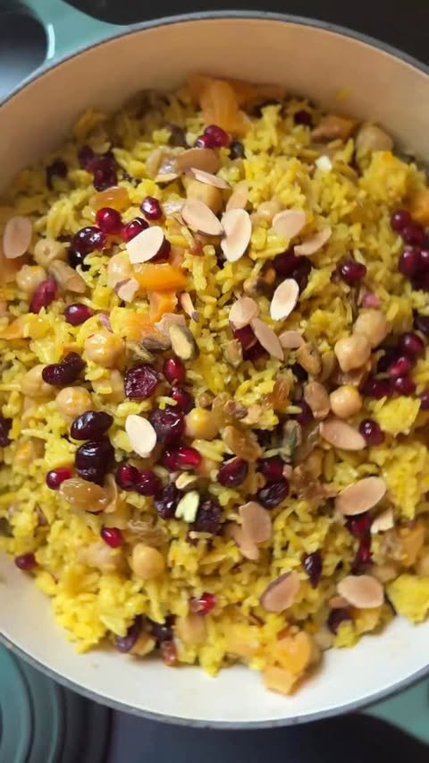 Instagram post by @justinchapple for Le Creuset. Caption reads: Inspired by Persian jeweled rice, this vibrant....