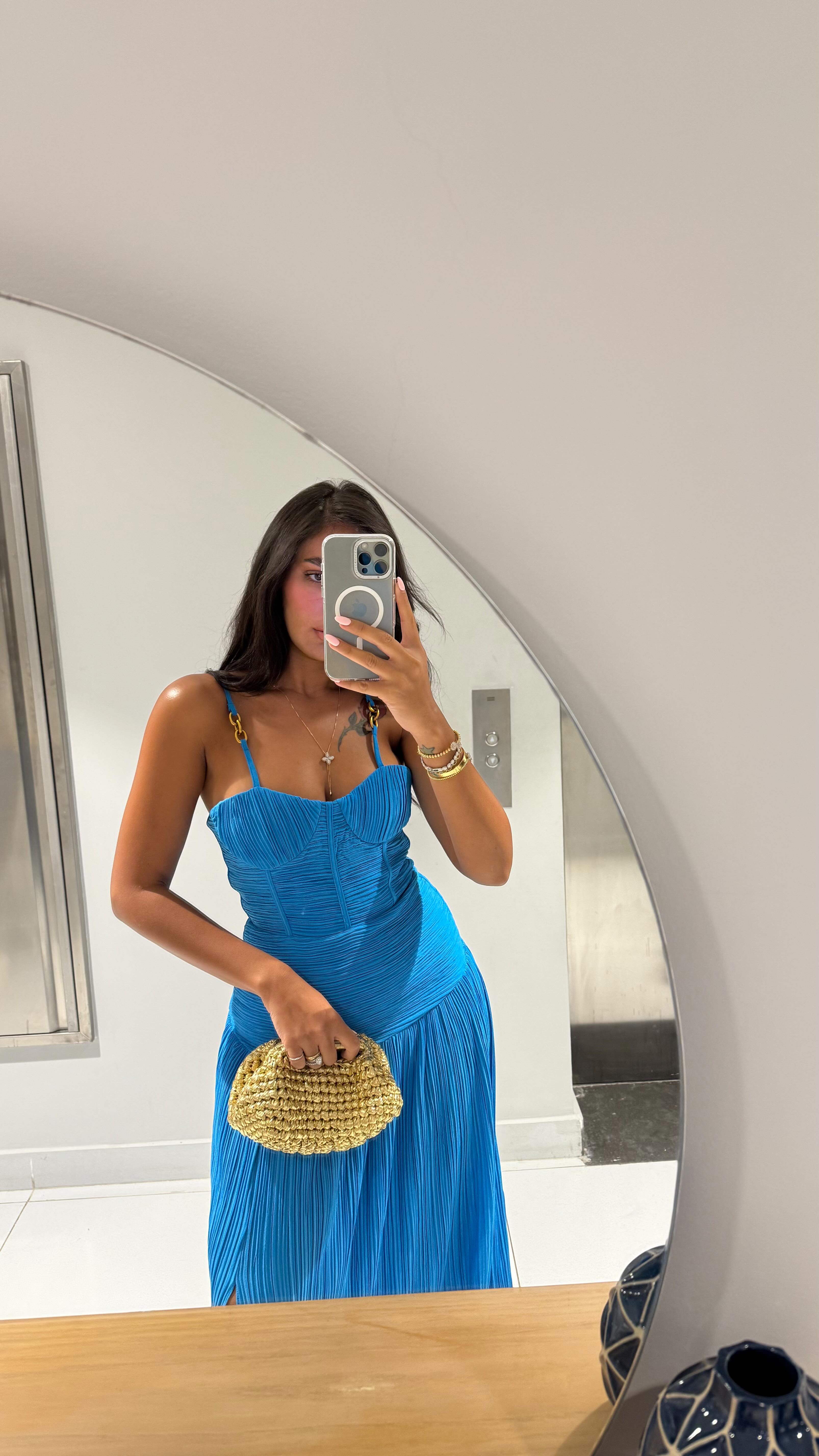 Instagram post by @mernaacherif for JardinVue. Caption reads: blue is my color🦋

dress @jardinvue  Discount....