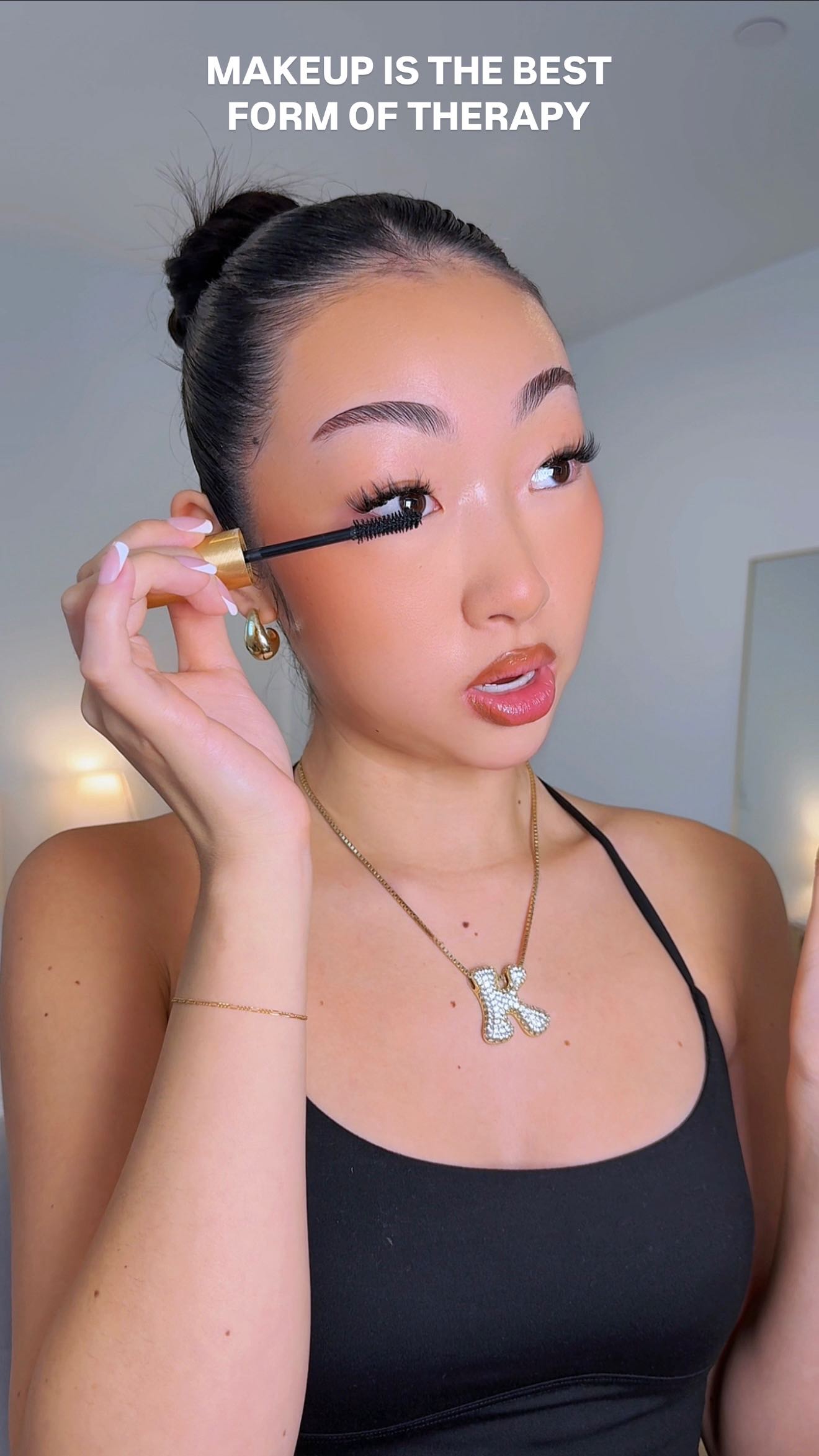 Instagram post by @itsbabykelz for Grande Cosmetics. Caption reads: makeup = girl therapy ✨ there’s also nothing....