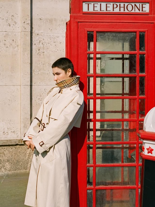Instagram post by @heir for Burberry. Caption reads: #ad @burberry buttoned to the top 🇬🇧♥️.