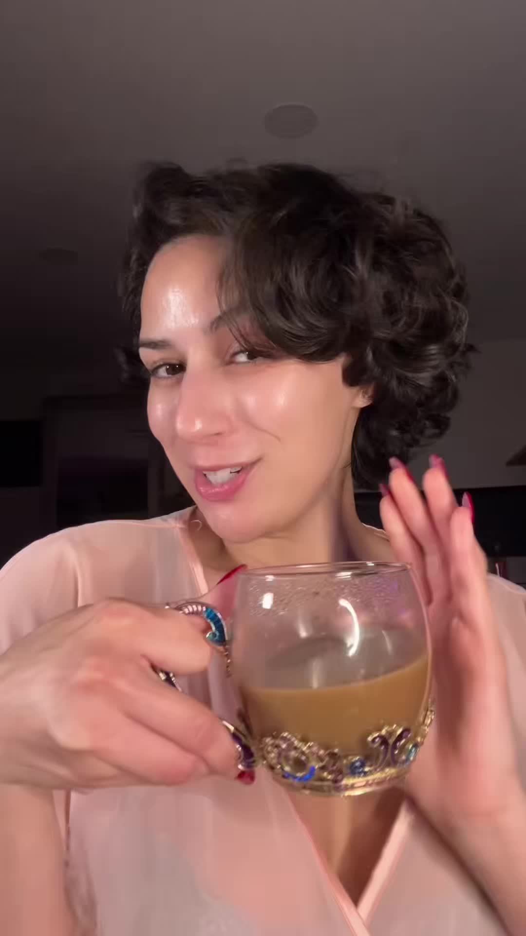 TikTok post by @alexi.styles for Jiggle Coffee. Caption reads: [...] Beauty Routine Unlocked 🔓☕️ @Jiggle Coffee....