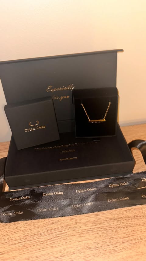 Instagram post by @our_life_as_three for Dylan Oaks. Caption reads: [...] is this personalised necklace fr....
