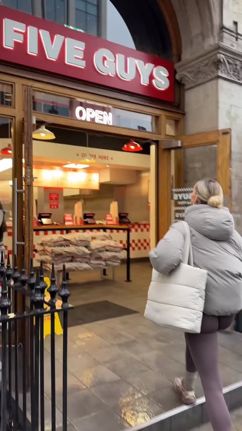 Instagram post by @eviepenington for Five Guys Burgers & Fries. Caption reads: one thing I’ll never ever give up on my fitness....