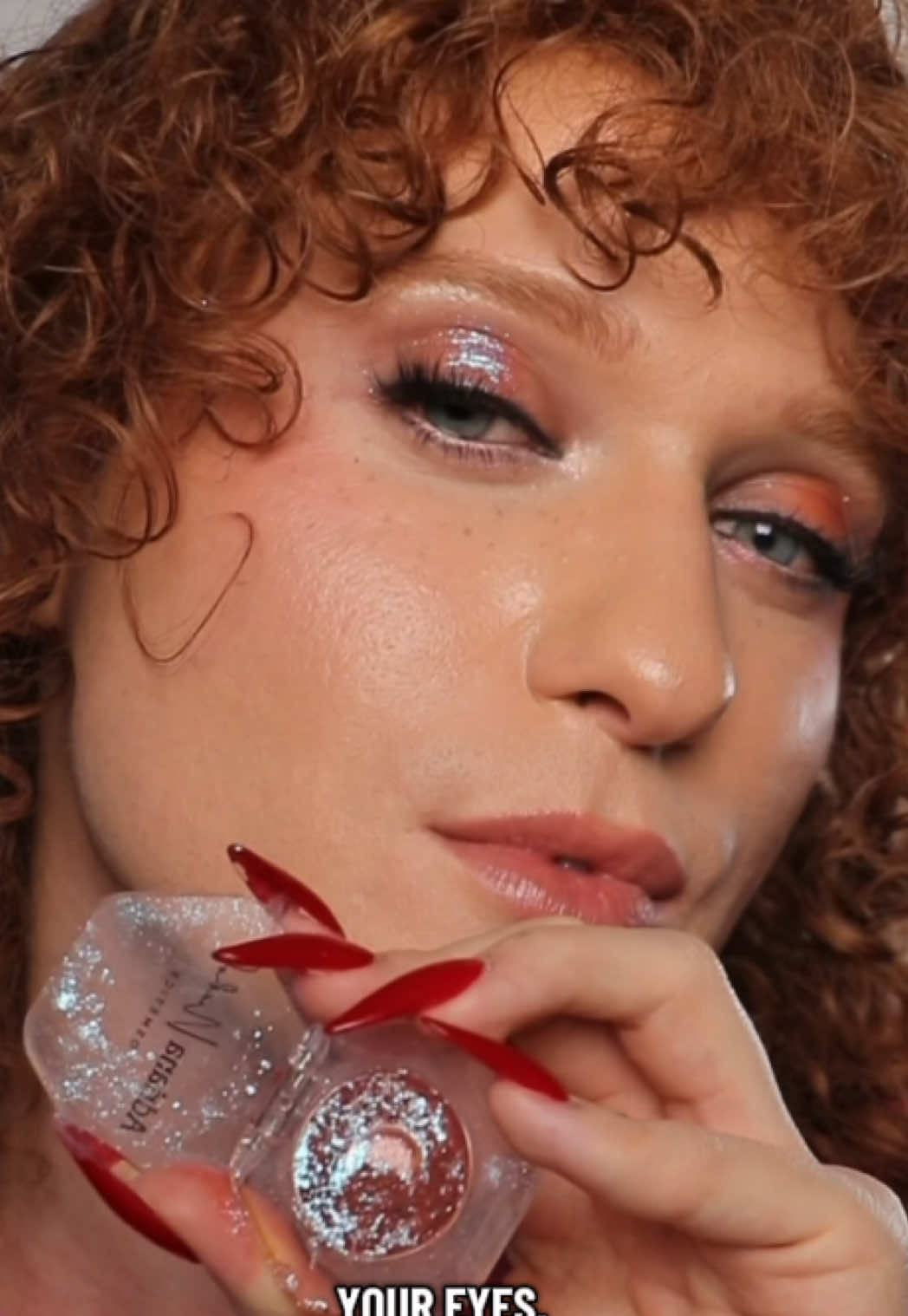 TikTok post by @elileviofficial for Adriana Nichole Cosmetics. Caption reads: NOW THIS IS EYESHADOW 🤩 @Adriana Nichole....