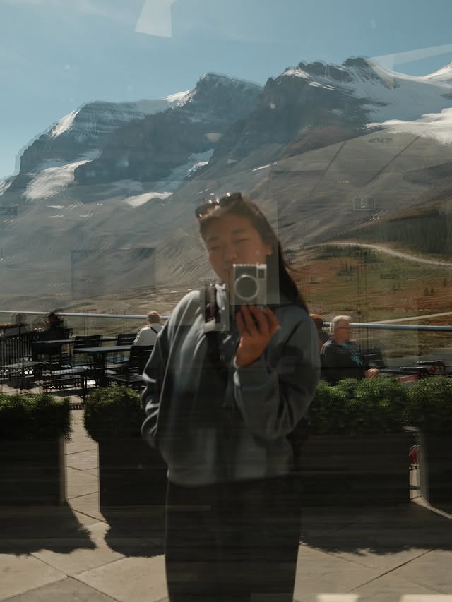 Instagram post by @alliee.c for The North Face. Caption reads: [...] scenic route ˙ ✩°˖🚙⋆｡˚꩜ wearing the....