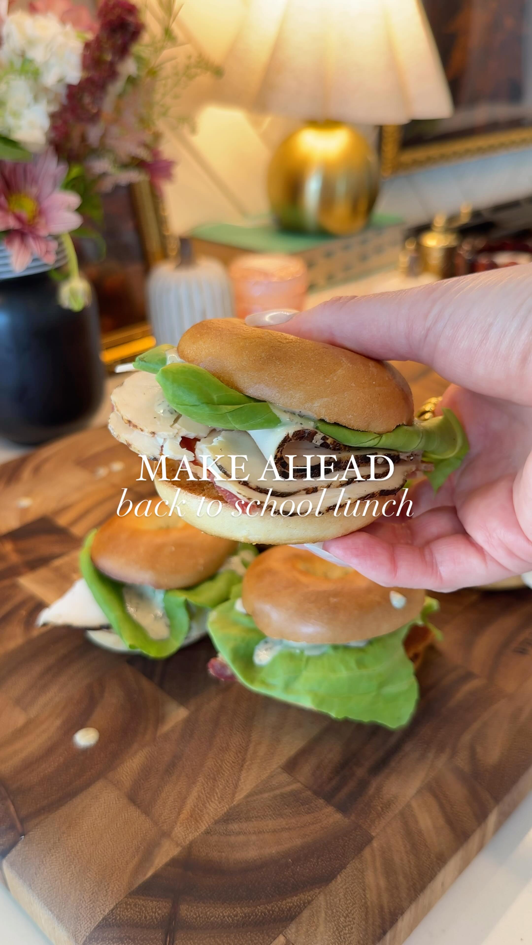 Instagram post by @kdamitz for Blues Hog. Caption reads: Mini bagels >>> boring sandwiches 🤌 These Chicken....