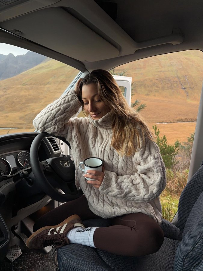 Instagram post by @marine_audineau for roadsurfer. Caption reads: [...] trip at a time 🌲🪵🚐
vanlife with....