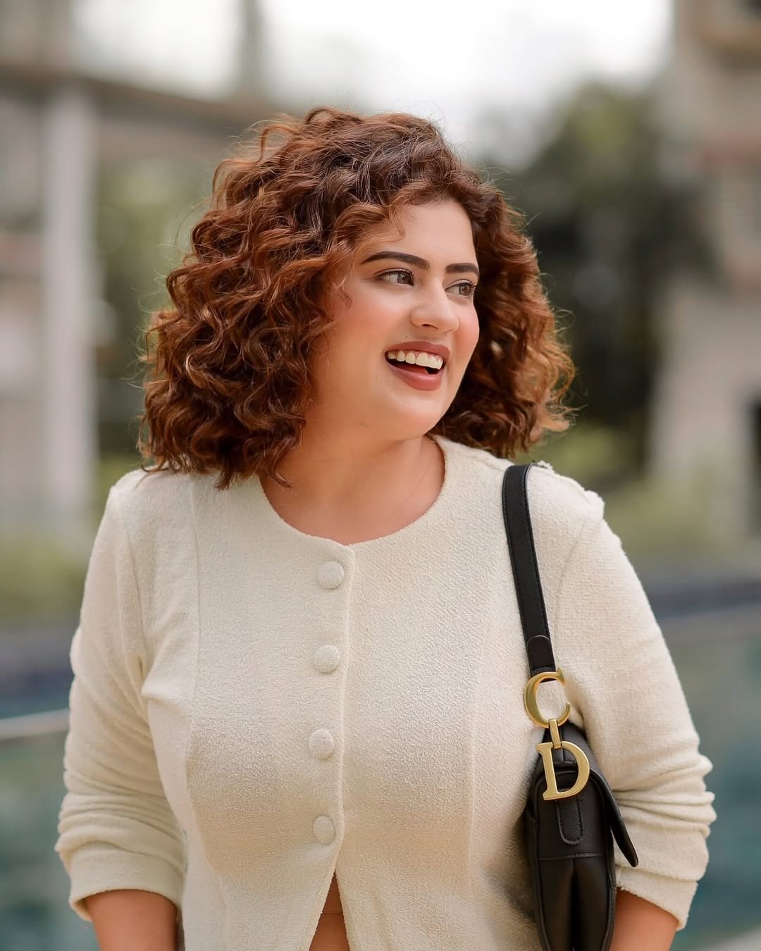 Instagram post by @curlgirlofficial for L’oréal Professionnel. Caption reads: #AD | I think I’ve found the hair colour that....