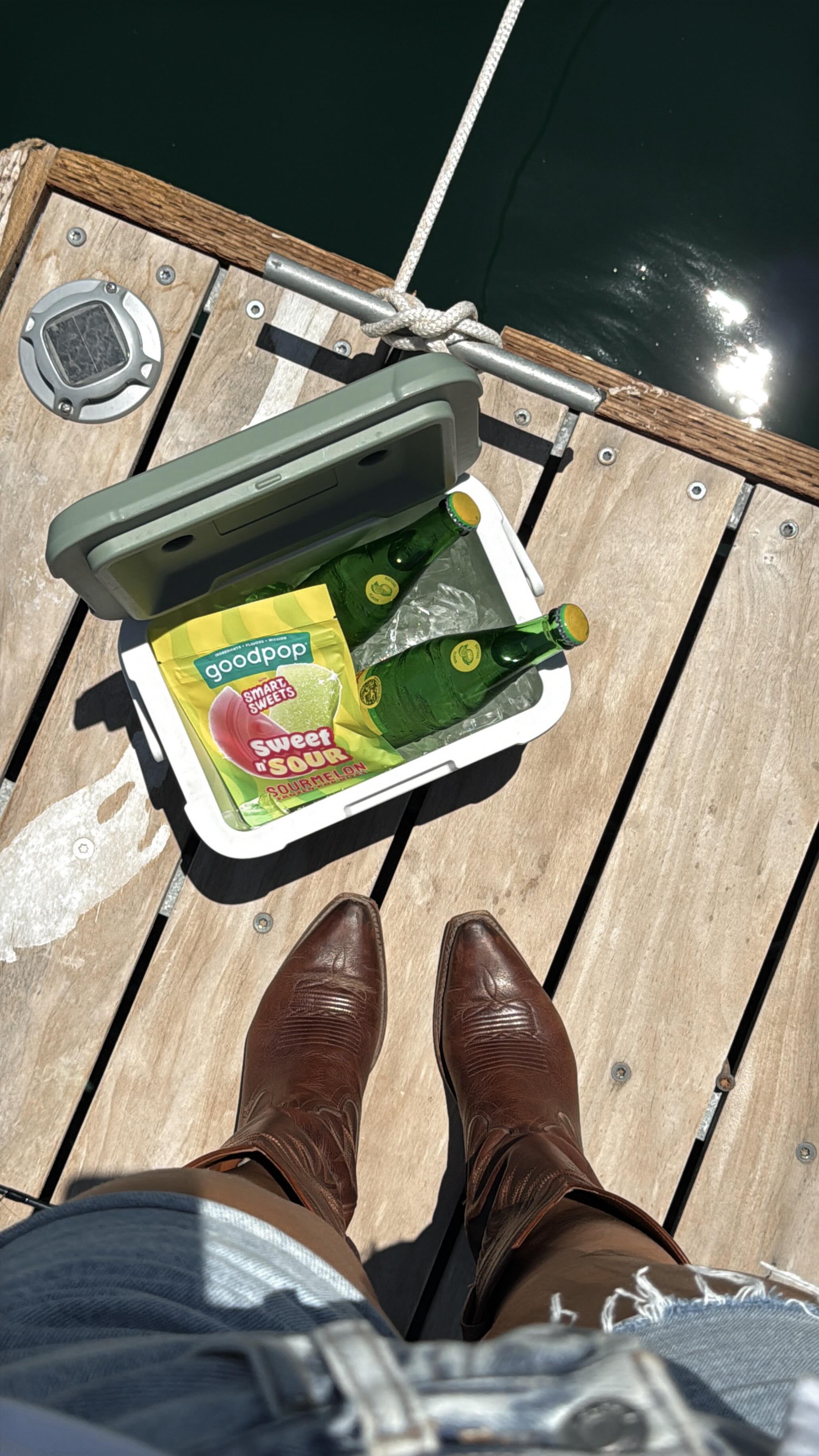 Instagram post by @juliastangler for SmartSweets. Caption reads: you can’t have a summer lake day without the....