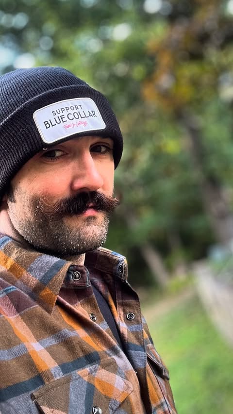 Instagram post by @bluecollarbobby for Troll Co. Clothing. Caption reads: Crocs pair well with sweatpants, won’t catch me in....