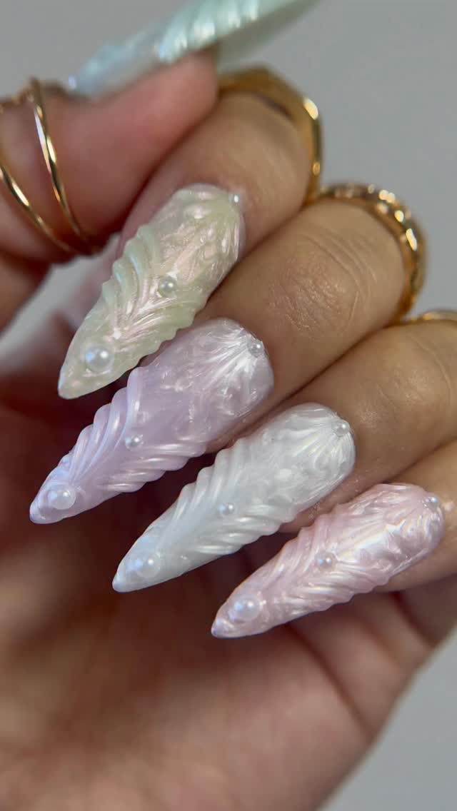 Instagram post by @nailsbynethan for Madam Glam. Caption reads: @madam_glam Pearl’s Iridescent River 

 

Apply my....