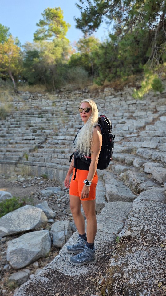 Instagram post by @sportpointextreme for Merrell. Caption reads: "From asphalt to trail, from rock to ridge — grip....