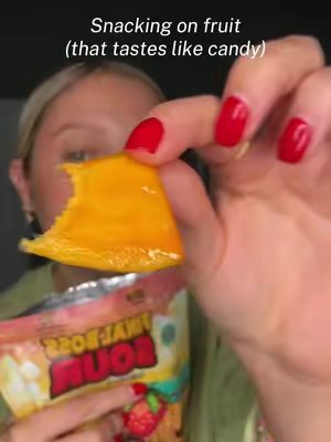 TikTok post by @abigailfeehls for Final Boss Sour. Caption reads: [...] & mango is such a good snack!!!!....
