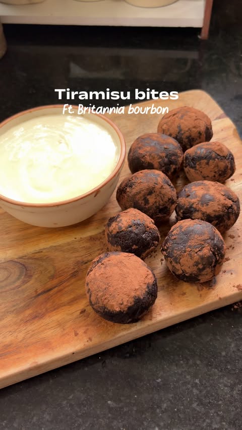Instagram post by @simarcookss for Britannia SnackInc. Caption reads: Britannia Bourbon Tiramisu Bites ☕🍫🤎 — giving....