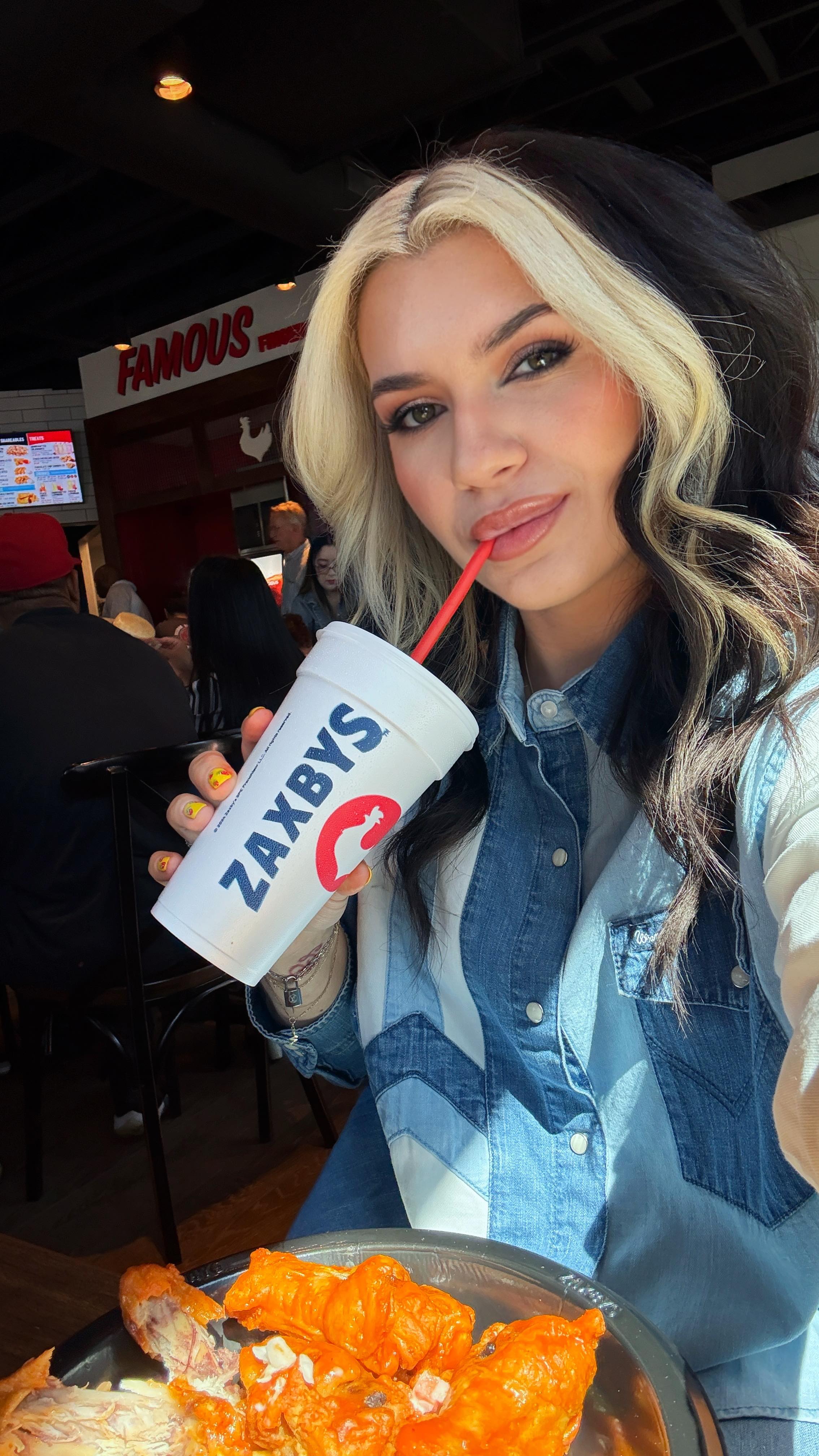 Instagram post by @thewymac for Zaxby's. Caption reads: Zaxby’s just landed in Vegas and I was #14 in line....