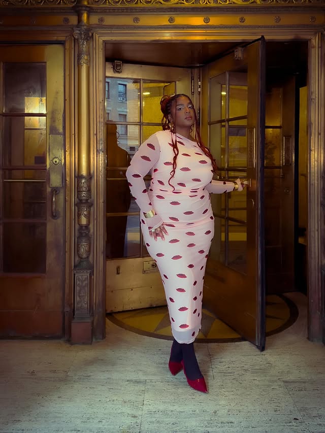 Instagram post by @sashacornielle for ELOQUII. Caption reads: Wrapped in love. Mon amour ❤️ @eloquii 

#ad.