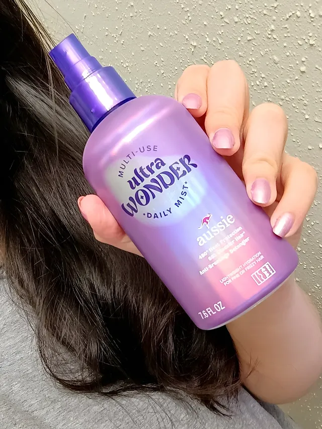 Instagram post by @alissa.denae for Aussie Hair. Caption reads: [...] any gunky residue.🟣 @influenster....