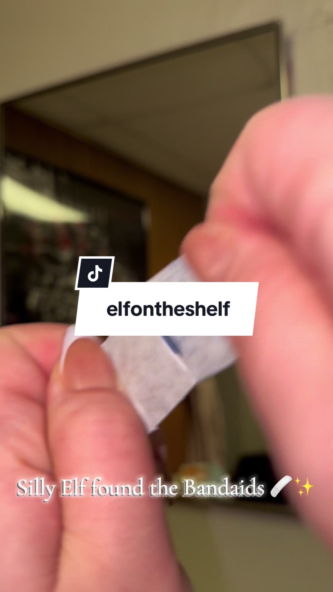 TikTok post by @its.haliem for The Elf on the Shelf. Caption reads: Silly elf 🩹✨ @The Elf on the Shelf #ElfOnTheShelf....