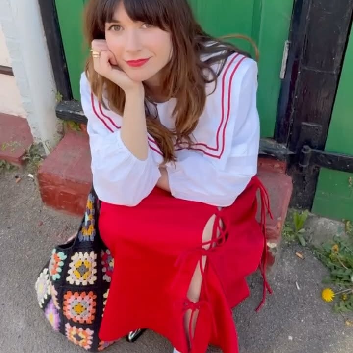 Instagram post by @daisyoliviaj for Damson Madder. Caption reads: [...] 
Shirt & skirt @damsonmadder * 
Socks....