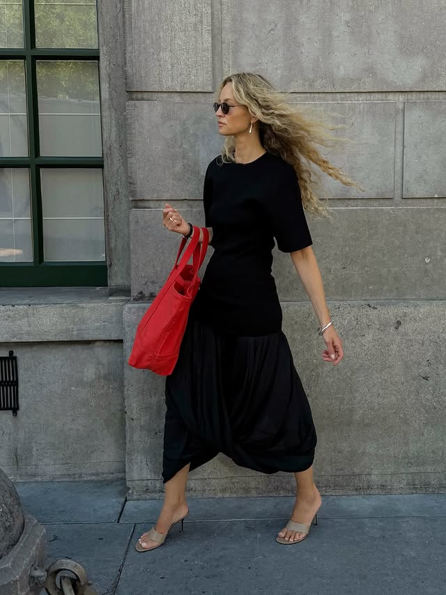 Instagram post by @anoukyve for NET-A-PORTER. Caption reads: I found my complete summer wardrobe at @netaporter....