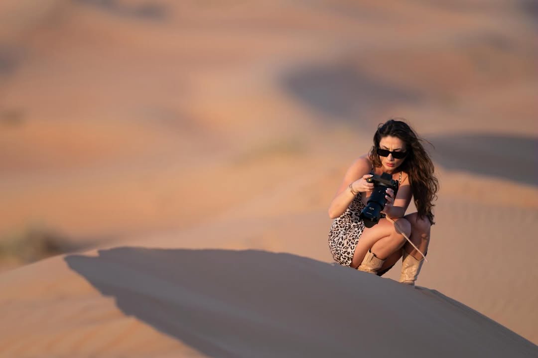Instagram post by @shawnparkerphotography for Peak Design. Caption reads: Welcome to Mars...…… 📍 Liwa, UAE 👨 Sigma....