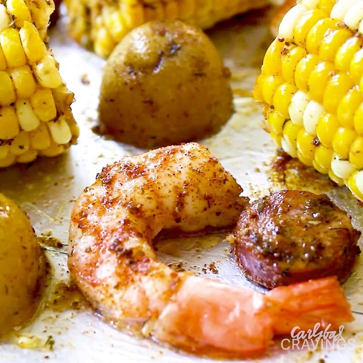 Instagram post by @carlsbadcravings for HuffPost. Caption reads: Easy SUMMER SHRIMP BOIL made hassle-free and....