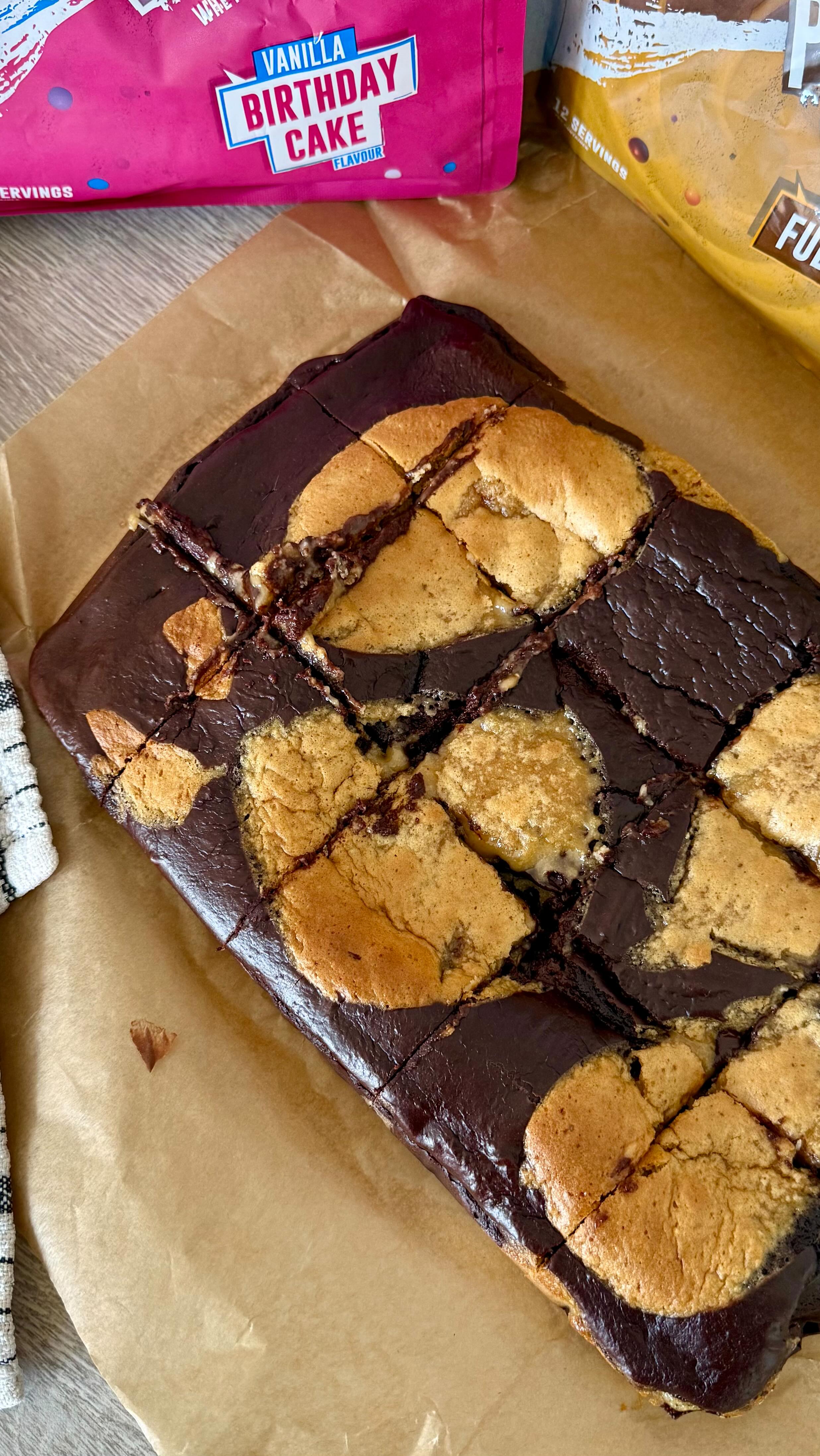 Instagram post by @kirstyfletcher for Grenade. Caption reads: can’t decide between a brownie or cookie? well....