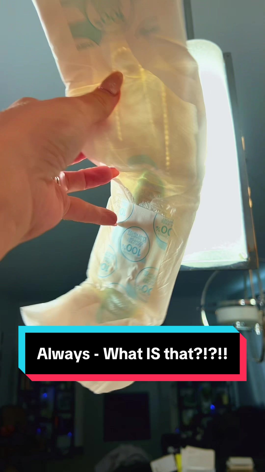 TikTok post by @realmelissasimo for Always. Caption reads: But what IS it?! Does it just look dirty under the....