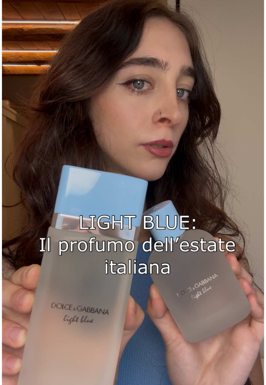 TikTok post by @sssinister_ for Dolce&Gabbana. Caption reads: Light Blue Eau de Toilette di @Dolce & Gabbana è....