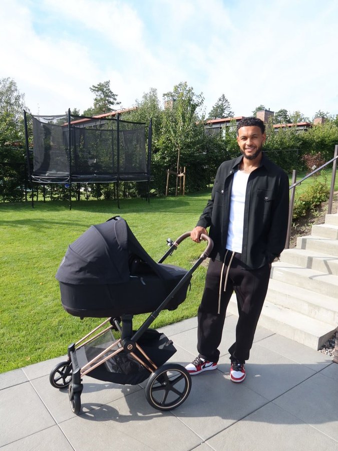 Instagram post by @iamjoshuaking for CYBEX. Caption reads: First stroll in the coolest Cybex priam😮‍💨
Thanx....