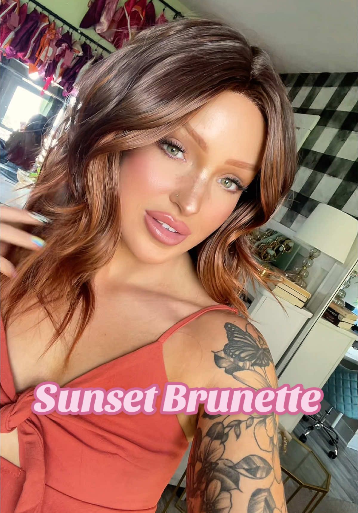 TikTok post by @nancysallee for Chelsey Smith Cosmetics. Caption reads: Sharpay short sunset brunette still in stock! 🔗....