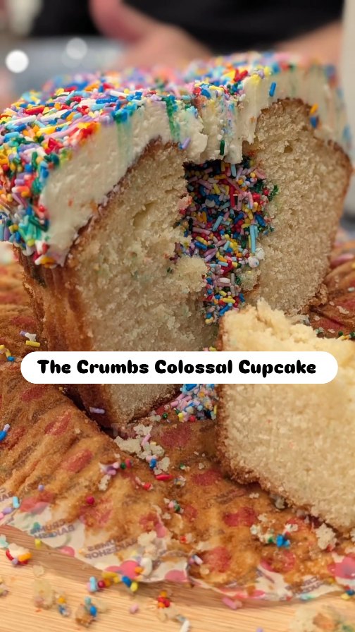 Instagram post by @pandemicfoodie for Original Crumbs. Caption reads: The Crumbs Colossal Cupcake is now available in....