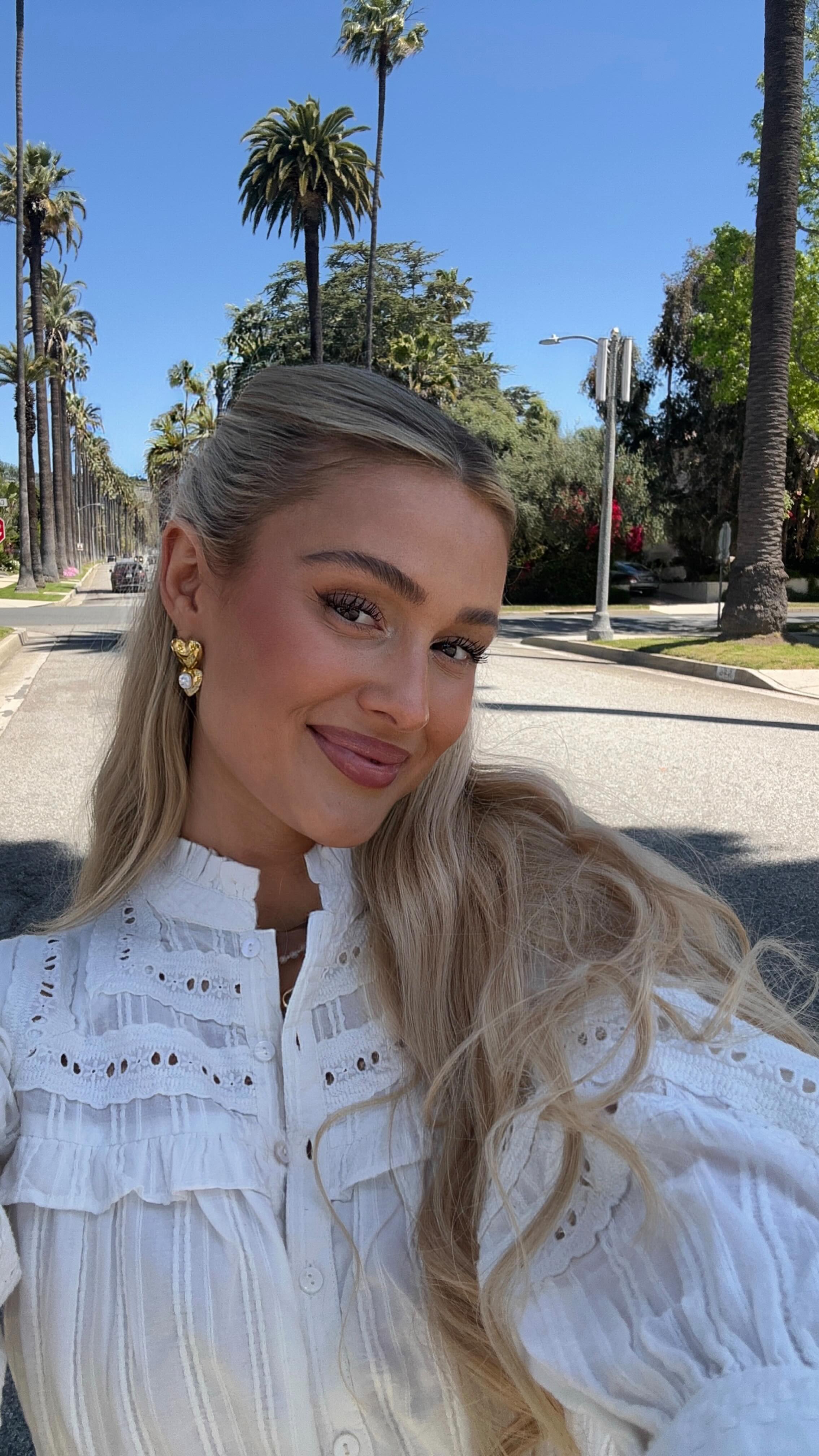 Instagram post by @danielleehxo for PURELEI. Caption reads: what I’m wearing this spring🌞🧚🏻‍♀️🎀🌾 *anzeige....